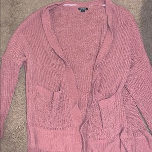 Cardigan with pockets that is a pink/mauve